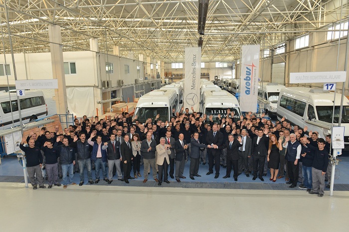 Arobus employees celebrate the 11,111th minibus modeled on the Mercedes-Benz Sprinter.