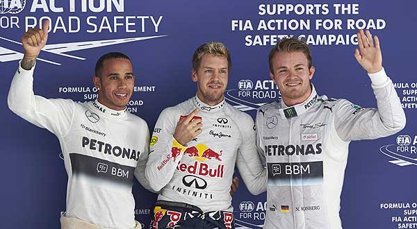 Mercedes-F1-drivers-Nico-Rosberg-and-Lewis-Hamilton-with-F1-champion-Sebastian-Vettel