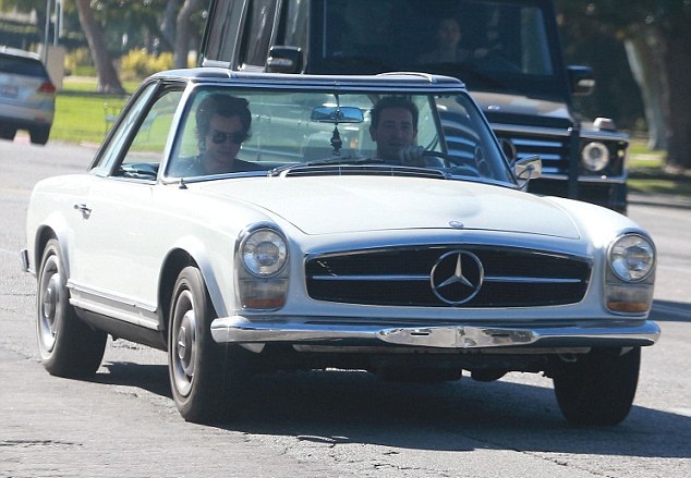 Harry Styles Seen Cruising in his 1966 Mercedes SL