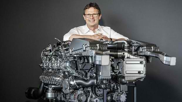 enderle poses with the new mercedes amg gt engine