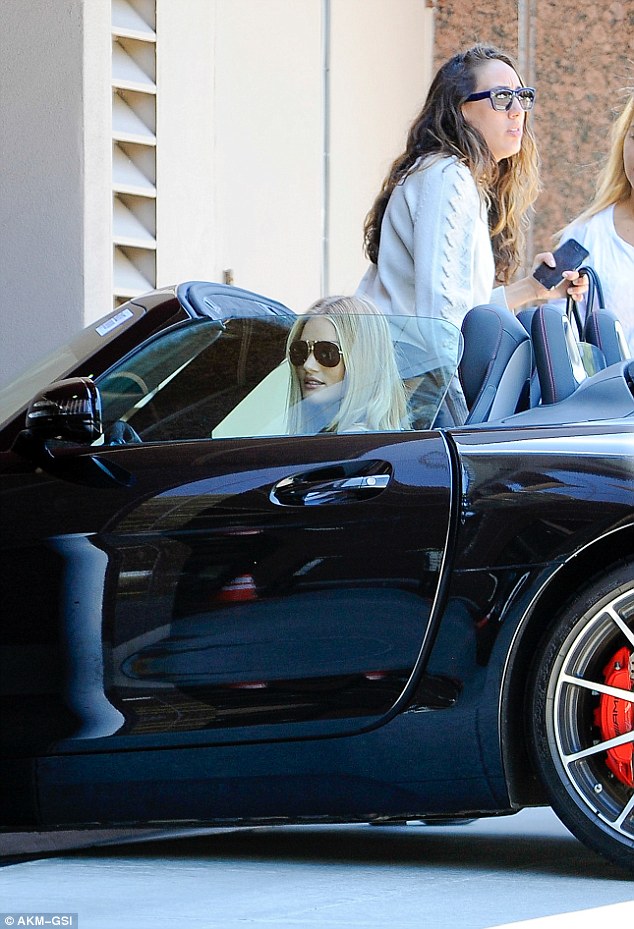 Rosie Huntington-Whiteley Seen Driving A Mercedes-Benz SLS AMG