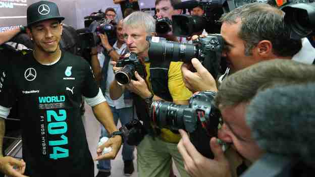 lewis hamilton dons a mercedes victory shirt