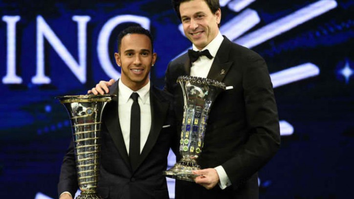 mercedes f1 team boss and hamilton with awards
