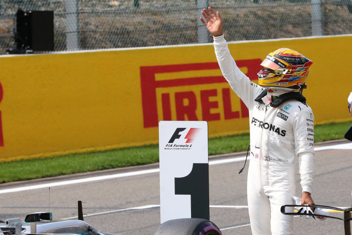 Hamilton takes pole at Belgium, matches Schumacher record